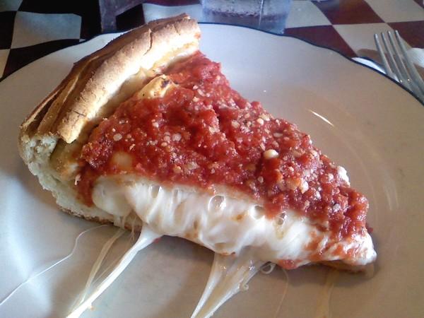 Photo of a slice of Giordano's pizza.