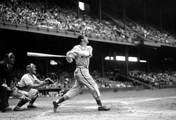 Photo of Stan Musial swinging the bat.