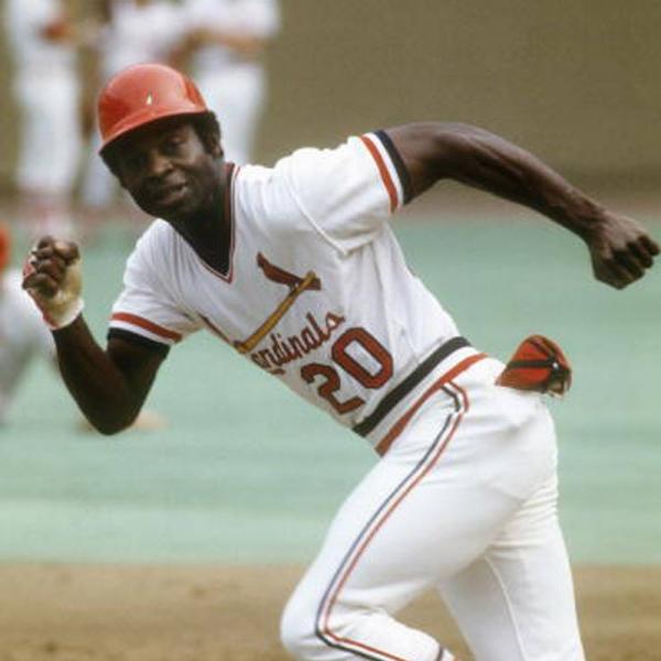 Photo of Lou Brock stealing a base